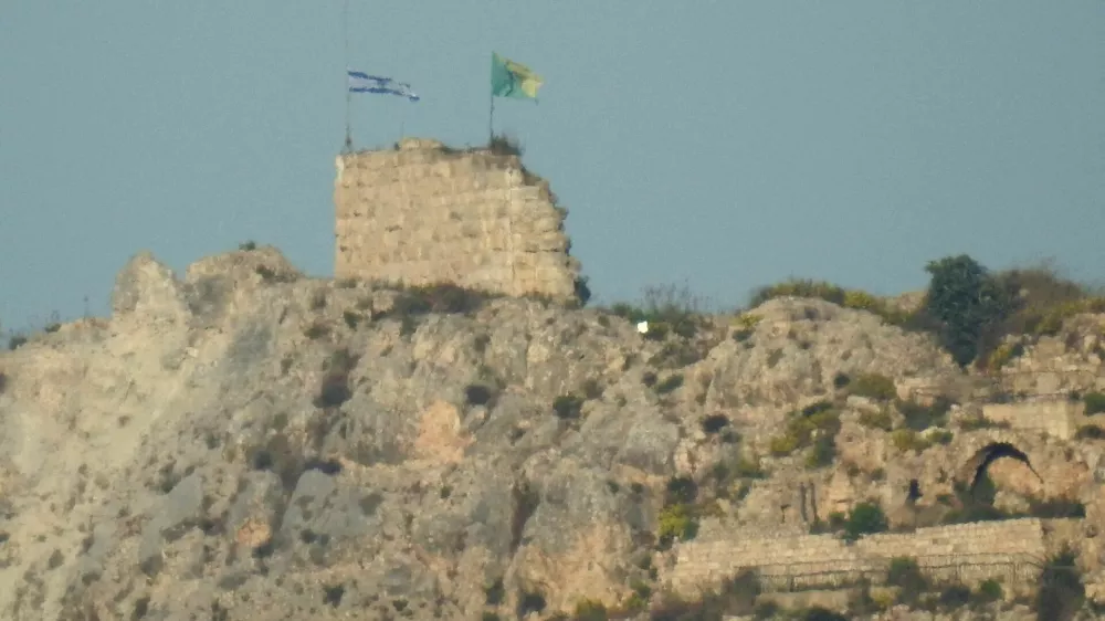 An Israeli flag and a flag of the Golani Brigade are raised on Beaufort Castle, as seen from Marjayoun, southern Lebanon, May 31, 2026. REUTERS/Stringer REFILE - ADDING INFORMATION "A FLAG OF THE GOLANI BRIGADE".   TPX IMAGES OF THE DAY