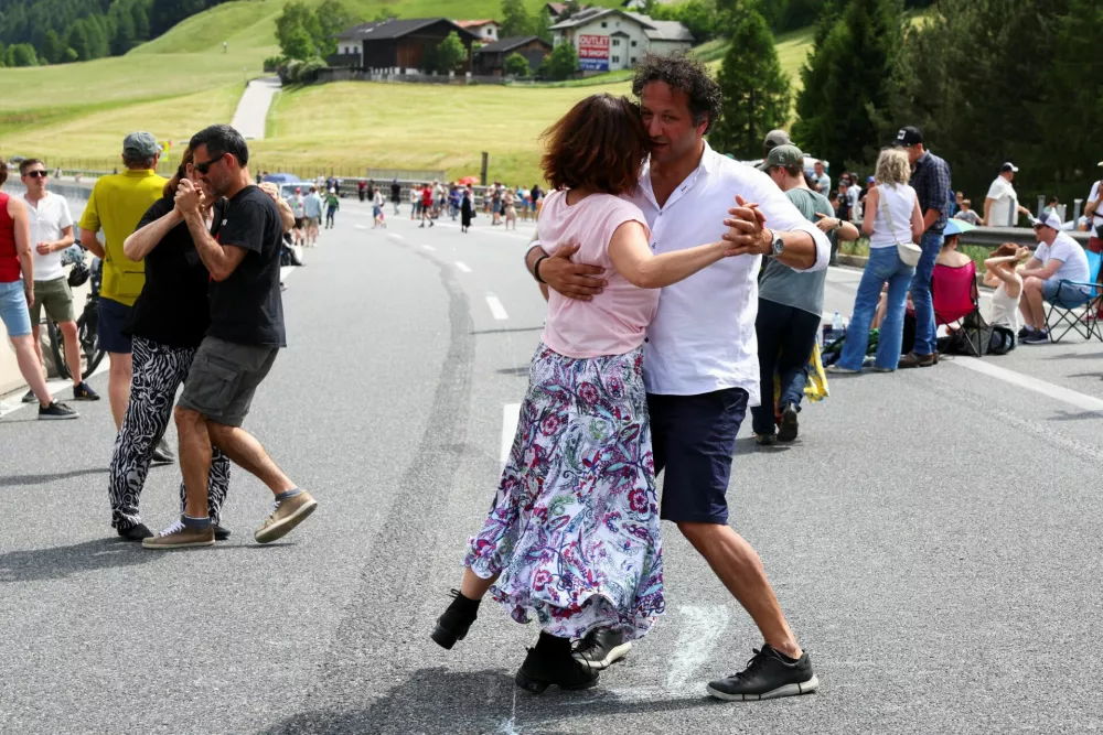 People dance on a closed motorway, as they protest against the growing traffic load on the Brenner motorway between Austria and Italy, near Matrei, Austria, May 30, 2026. REUTERS/Christian Mang
