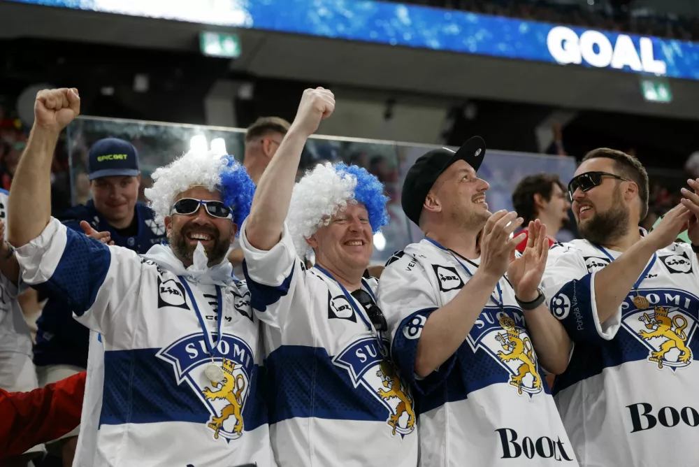 Ice Hockey - IIHF World Championships - Semi Final - Canada v Finland - Swiss Life Arena, Zurich, Switzerland - May 30, 2026 Finland fans celebrate after Aleksander Barkov scores their second goal REUTERS/David W Cerny