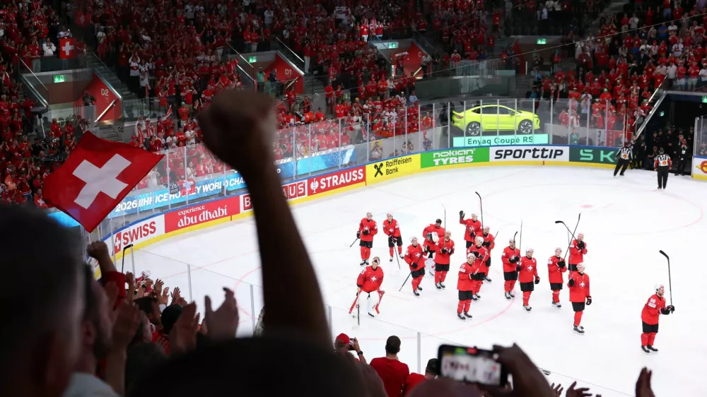 Ice Hockey - IIHF World Championships - Semi Final - Switzerland v Norway - Swiss Life Arena, Zurich, Switzerland - May 30, 2026 Switzerland players celebrate after the match REUTERS/Denis Balibouse