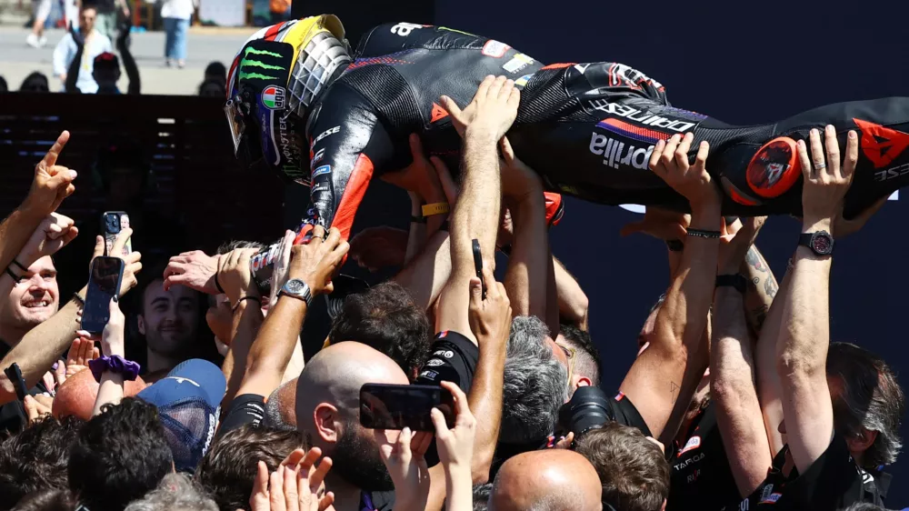 MotoGP - Italian Grand Prix - Mugello Circuit, Scarperia e San Piero, Italy - May 31, 2026 Aprilia Racing's Marco Bezzecchi celebrates after winning the MotoGP race REUTERS/Ciro De Luca