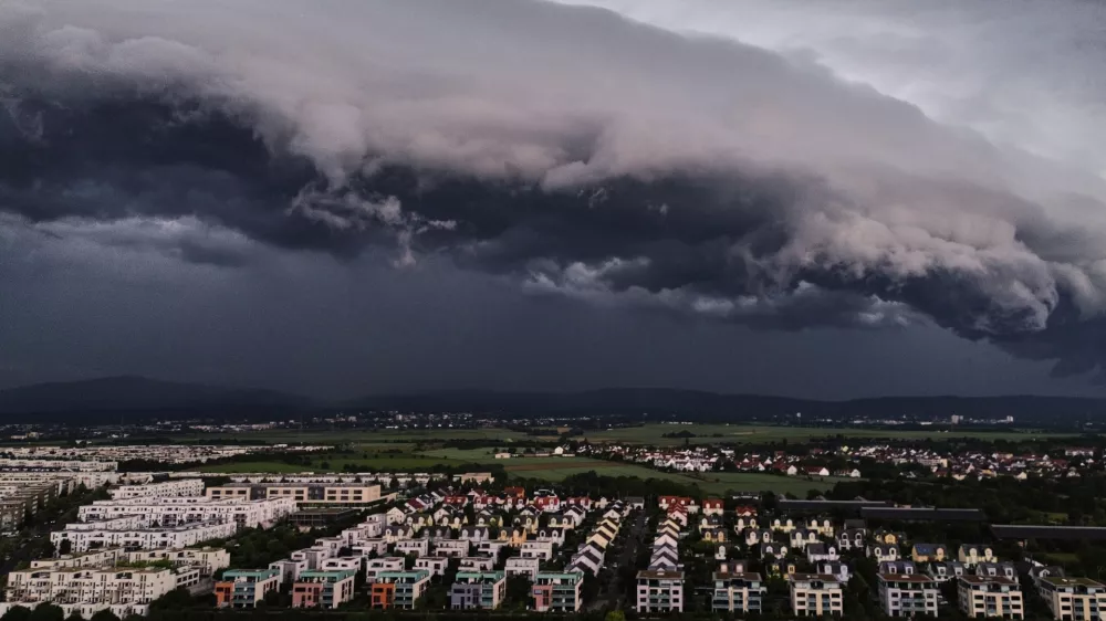 A thunder storm approaches the outskirts of Frankfurt, Germany, Sunday, May 31, 2026. (AP Photo/Michael Probst)
