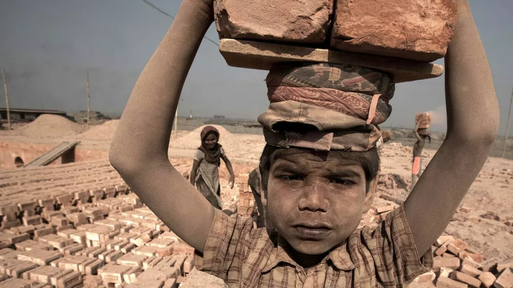 Brickworks Hell - zReportage.com Story of the Week #316- Launched May 11, 2010 - Full multimedia experience: audio, stills, text and or video: Go to to see more. - PICTURED - Feb 15, 2010 - Dhaka, Bangladesh - People come from all over Bangladesh to work at the brick factories on outskirts of Dhaka to work 7 months a year for 100 Dhakas a day.,Image: 39219082, License: Rights-managed, Restrictions: * Korea Rights OUT *, Model Release: no 