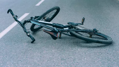 Bicycle lies on the pavement on the roadway. Concept on the theme of the accident