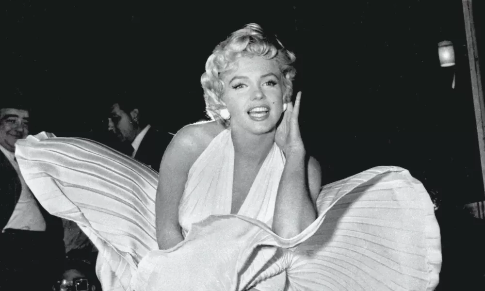 Designer William Travilla created The Seven Year Itch's white dress and he dreamed up the pink and gold gowns from Gentlemen Prefer Blondes &ndash; all famous Monroe getups. Although the designer never paid much heed to his creation (once dismissing it as "that silly little dress") it has paid off, and was sold at a 2011 auction for .6m. The auction resulted from Debbie Reynolds' need to sell off assets to avoid bankruptcy. Those assets included her collection of Old Hollywood memorabilia (that she hoped to eventually house in a museum of her own), among which was Monroe's dress &ndash; which Reynolds said she only paid 0 for in 1971 - Anne T Donahue,Image: 580025776, License: Royalty-free, Restrictions:, Model Release: no