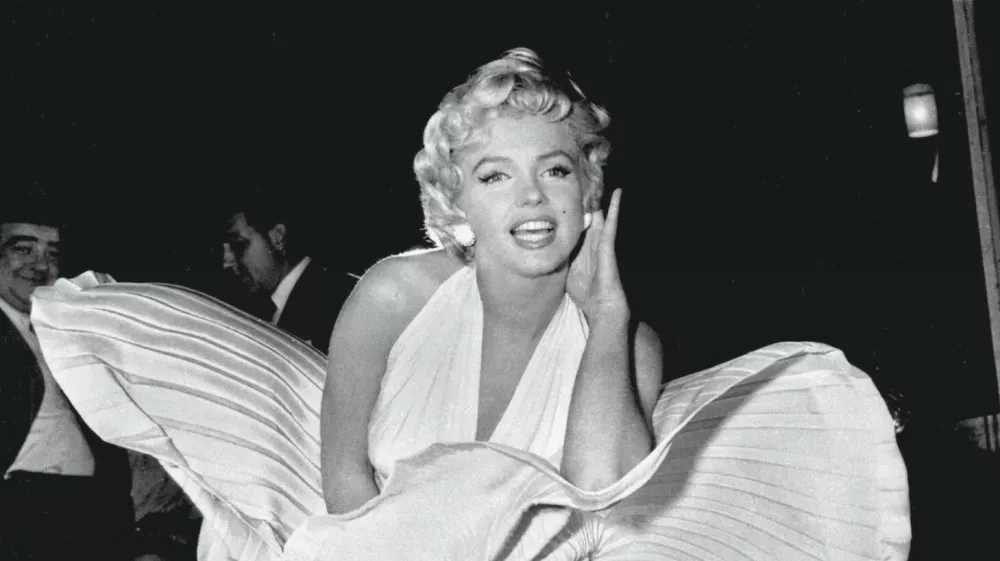 Designer William Travilla created The Seven Year Itch's white dress and he dreamed up the pink and gold gowns from Gentlemen Prefer Blondes &ndash; all famous Monroe getups. Although the designer never paid much heed to his creation (once dismissing it as "that silly little dress") it has paid off, and was sold at a 2011 auction for $4.6m. The auction resulted from Debbie Reynolds' need to sell off assets to avoid bankruptcy. Those assets included her collection of Old Hollywood memorabilia (that she hoped to eventually house in a museum of her own), among which was Monroe's dress &ndash; which Reynolds said she only paid $200 for in 1971 - Anne T Donahue,Image: 580025776, License: Royalty-free, Restrictions:, Model Release: no