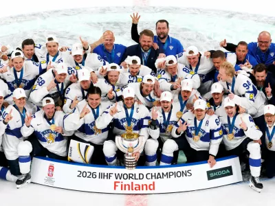Players of Finland celebrate with the World Champion trophy after winning the gold medal ice hockey match between Finland and Switzerland at the 2026 IIHF Men's Ice Hockey World Championship in Zurich, Switzerland, Sunday, May 31, 2026. (Salvatore Di Nolfi/Keystone via AP)