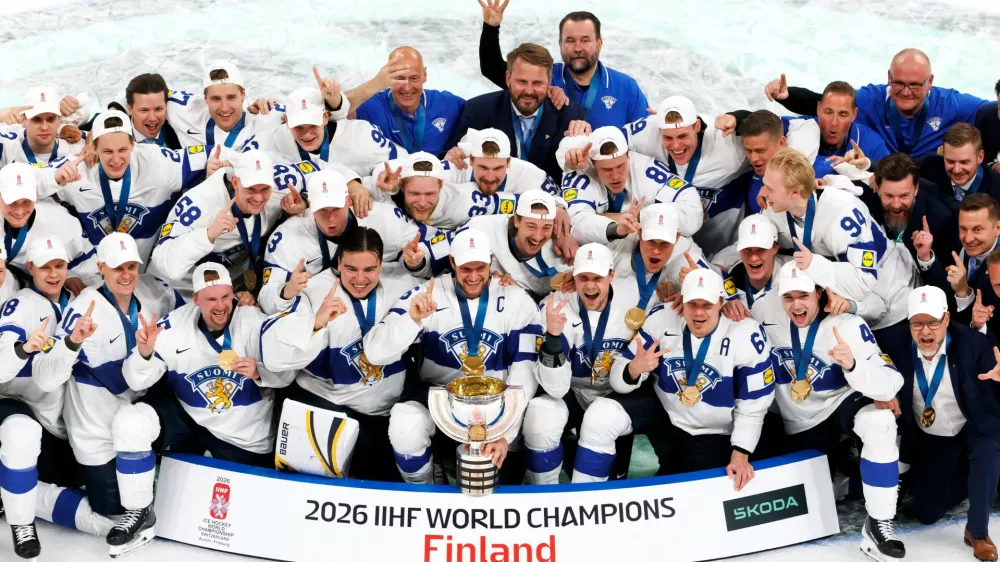 Players of Finland celebrate with the World Champion trophy after winning the gold medal ice hockey match between Finland and Switzerland at the 2026 IIHF Men's Ice Hockey World Championship in Zurich, Switzerland, Sunday, May 31, 2026. (Salvatore Di Nolfi/Keystone via AP)