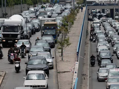Cars sit in traffic on a highway as residents flee following an Israeli threat to strike Dahiyeh, Beirut's southern suburbs, Lebanon, Monday, June 1, 2026. (AP Photo/Bilal Hussein)