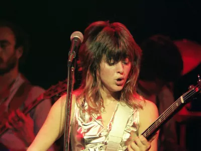 LONDON, UNITED KINGDOM - NOVEMBER 2: Suzi Quatro performs on stage at Hammersmith Odeon on November 2nd, 1978 in London, England. (Photo by Pete Still/Redferns)