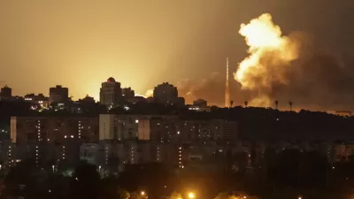 An explosion lights up the sky over the city during a Russian missile and drone strike, amid Russia's attack on Ukraine, in Kyiv, Ukraine June 2, 2026. REUTERS/Vladyslav Sodel