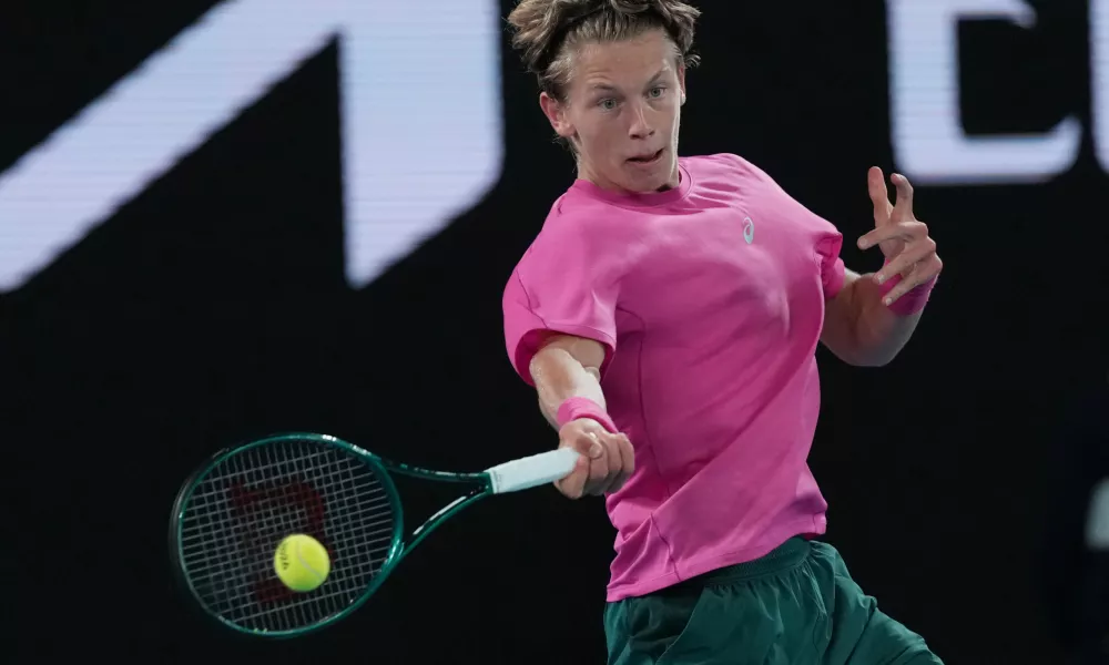 Ziga Sesko of Slovenia plays a forehand return to Keaton Hance of the U.S. during the boy's singles final at the Australian Open tennis championship in Melbourne, Australia, Sunday, Feb. 1, 2026. (AP Photo/Dar Yasin)