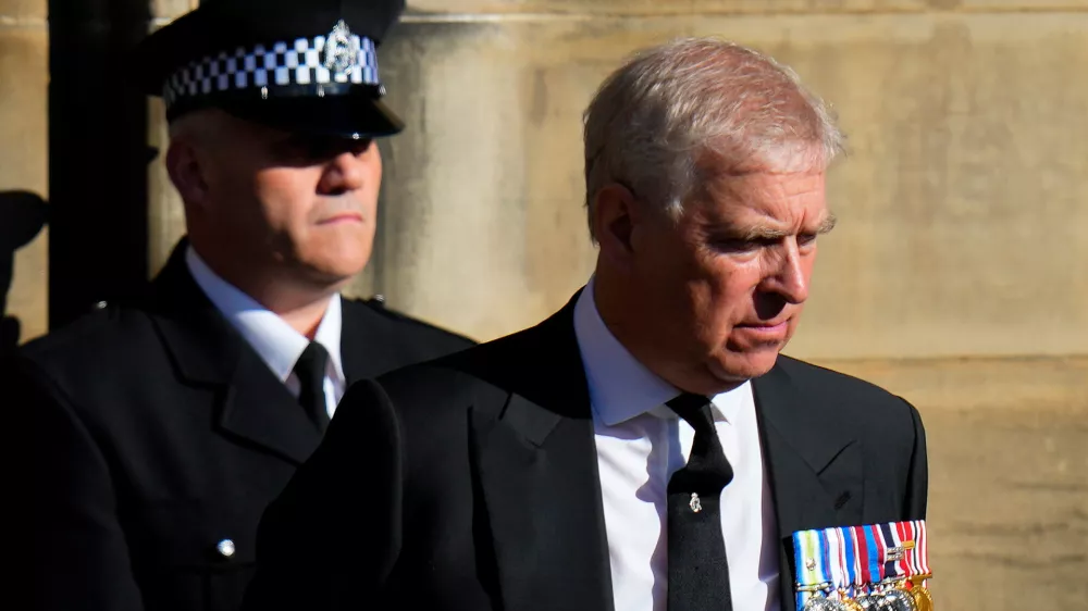 FILE - Prince Andrew leaves St. Giles Cathedral after the arrival of the coffin containing the remains of his mother Queen Elizabeth, in Edinburgh, Scotland, Sept. 12, 2022. (AP Photo/Petr David Josek, File)
