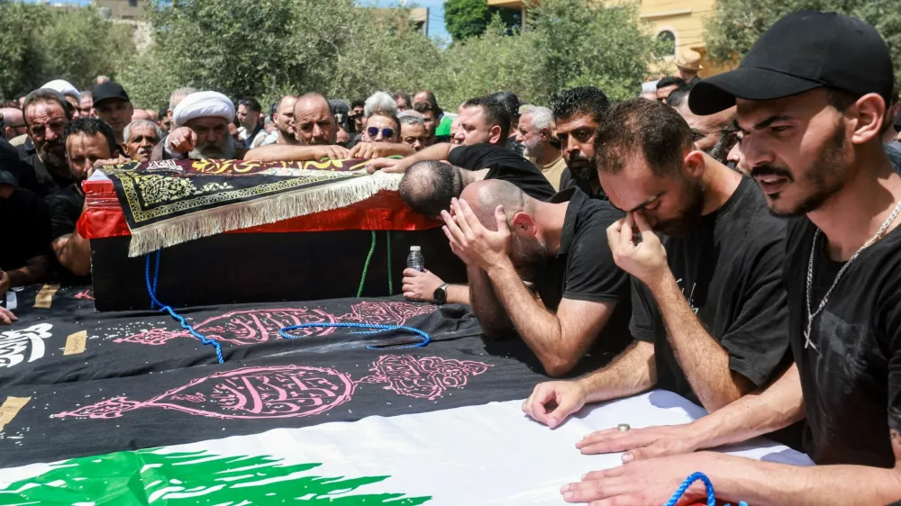 Mourners attend the funeral of Lebanese parents Hassan Abdullah and Hanan Shehab and their children Leen, Ali, Ibraheem and Julia, who were killed in an Israeli strike, in Wardaniyeh, Lebanon, June 3, 2026. REUTERS/Aziz Taher
