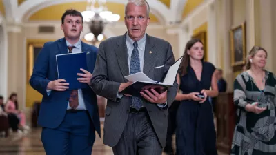 Sen. Dan Sullivan, R-Alaska, heads to a closed-door meeting with fellow Republicans, at the Capitol in Washington, Tuesday, June 2, 2026. (AP Photo/J. Scott Applewhite)
