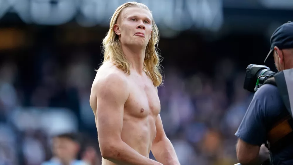 Manchester City's Erling Haaland reacts at the end of the English Premier League soccer match between Manchester City and and Arsenal, in Manchester, England, Sunday, April 19, 2026. (AP Photo/Dave Thompson)