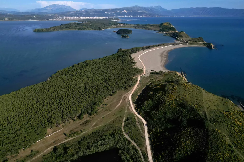 A drone view of the bay of Zvernec in the Vjosa-Narte protected area where a luxury resort is planned by a company linked with Donald Trump's son-in-law Jared Kushner, near Vlora, Albania, May 31, 2026. REUTERS/Florion Goga