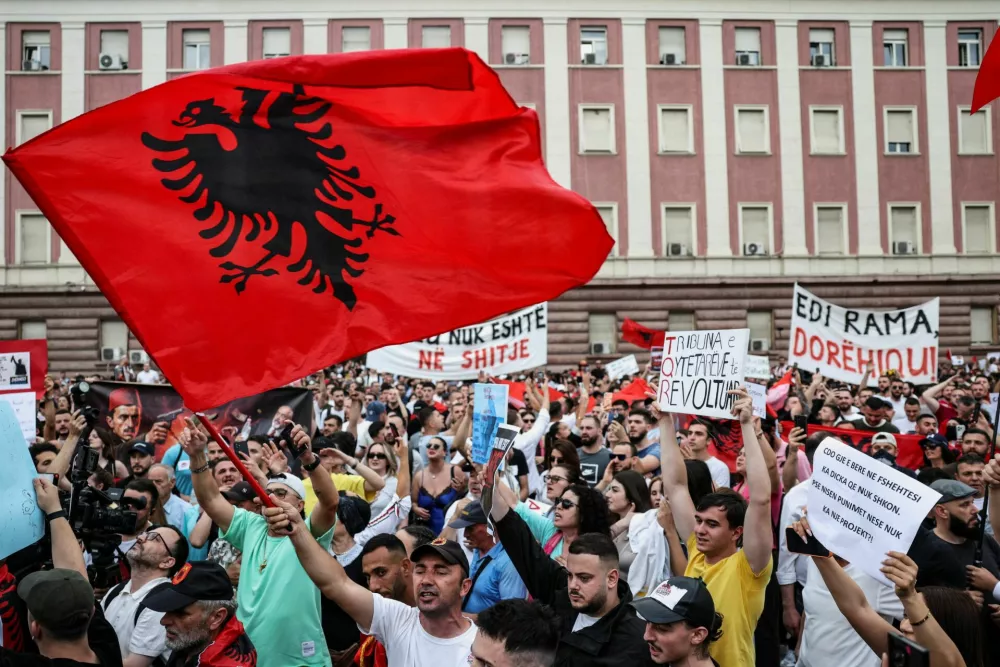 Demonstrators take part in a protest against a planned luxury resort backed by a company linked to Jared Kushner, the son-in-law of U.S. President Donald Trump, on an environmentally sensitive part of the Adriatic coast, in Tirana, Albania, June 3, 2026. REUTERS/Florion Goga