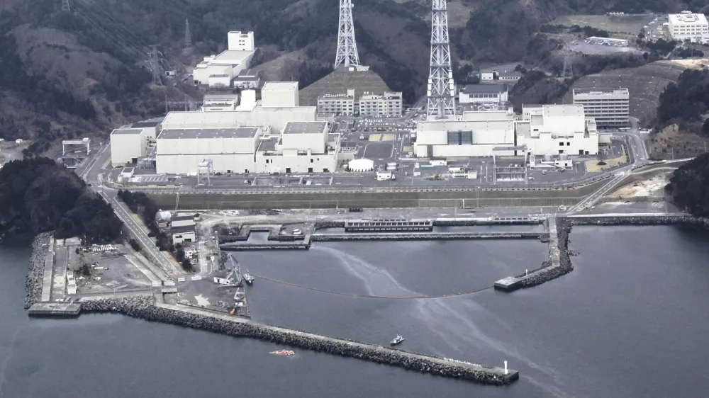 An aerial view shows Onagawa Nuclear Power Plant is seen at Miyagi Prefecture in this photo taken by Yomiuri Shimbun on April 8, 2011. Water leaked out of spent fuel pools at the Onagawa nuclear plant in northeast Japan after a strong aftershock rocked the region late on Thursday, but there was no change in the radiation levels outside the plant, operator Tohoku Electric Power said on Friday. Mandatory credit REUTERS/Yomiuri Shimbun (JAPAN - Tags: DISASTER ENERGY ENVIRONMENT) JAPAN OUT. NO COMMERCIAL OR EDITORIAL SALES IN JAPAN. FOR EDITORIAL USE ONLY. NOT FOR SALE FOR MARKETING OR ADVERTISING CAMPAIGNS. THIS IMAGE HAS BEEN SUPPLIED BY A THIRD PARTY. IT IS DISTRIBUTED, EXACTLY AS RECEIVED BY REUTERS, AS A SERVICE TO CLIENTS. YES