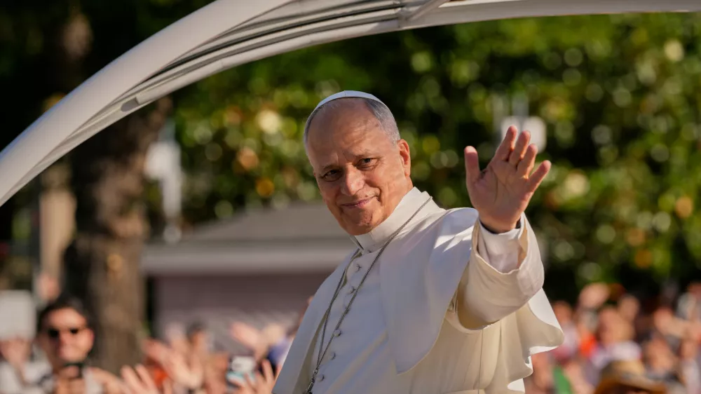 Pope Leo XIV arrives in the popemobile at Plaza de Cibeles for a Holy Mass and Corpus Christi procession in Madrid, Spain, Sunday, June 7, 2026, on the second day of his seven-day apostolic visit to mainland Spain and the Canary Islands. (AP Photo/Bernat Armangue)