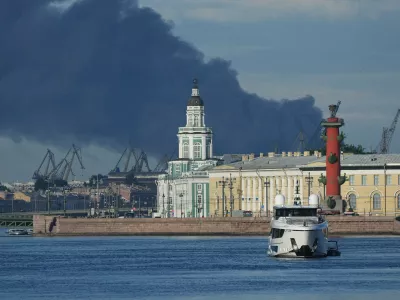 A plume of black smoke is seen over the port of St. Petersburg, Russia, Wednesday, June 3, 2026, after a Ukrainian drone attack. (AP Photo)
