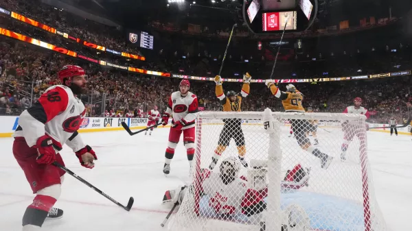 Carolina Hurricanes left wing Jordan Martinook (48) reacts after Vegas Golden Knights defenseman Shea Theodore scored during the the second overtime in Game 3 of the NHL hockey Stanley Cup Final series, Saturday, June 6, 2026, in Las Vegas. (AP Photo/Candice Ward)