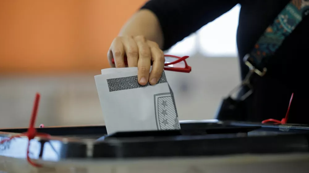 A person votes during a snap parliamentary election in Pristina, Kosovo, June 7, 2026. REUTERS/Valdrin Xhemaj