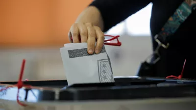A person votes during a snap parliamentary election in Pristina, Kosovo, June 7, 2026. REUTERS/Valdrin Xhemaj