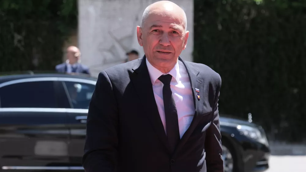 Slovenia's Prime Minister Janez Jansa arrives to attend the EU-Western Balkans summit in Tivat, Montenegro, Friday, June 5, 2026. (AP Photo/Risto Bozovic)