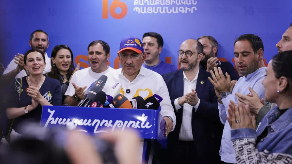Armenian Prime Minister Nikol Pashinyan speaks at his Armenia Ruling Civil Contract party headquarters after parliamentary elections in Yerevan, Armenia, Monday, June 8, 2026. (AP Photo/Anthony Pizzoferrato)