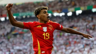 FILE PHOTO: Soccer Football - Euro 2024 - Quarter Final - Spain v Germany - Stuttgart Arena, Stuttgart, Germany - July 5, 2024 Spain's Lamine Yamal celebrates after Dani Olmo scores their first goal REUTERS/Heiko Becker/File Photo