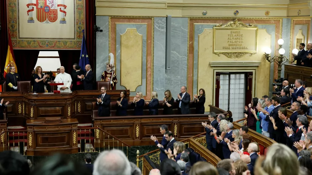 Pope Leo XIV is applauded at the end of his speech during his visit at the Spanish Parliament, next to Francina Armengol, President of the Congress of Deputies of Spain and Pedro Rollan, President of the Senate, during his apostolic journey in Madrid, Spain, June 8, 2026. EFE/Ballesteros/Pool via REUTERS