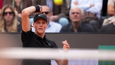 Italy's Jannik Sinner returns the ball to Andrey Rublev, during their match at the Italian Open tennis tournament in Rome, Thursday, May 14, 2026. (AP Photo/Andrew Medichini)