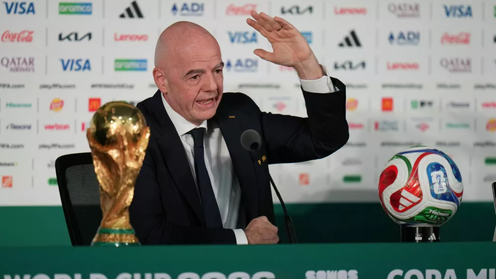 FIFA President Gianni Infantino speaks during a news conference at the stadium in Mexico City, Wednesday, June 10, 2026, a day before the opening FIFA World Cup match between Mexico and South Africa. (AP Photo/Eduardo Verdugo)