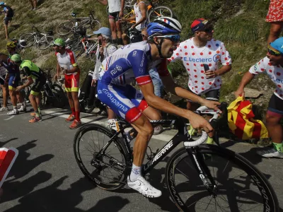 France's Thibaut Pinot climbs the Tourmalet pass during the fourteenth stage of the Tour de France cycling race over 117.5 kilometers (73 miles) with start in Tarbes and finish at the Tourmalet pass, France, Saturday, July 20, 2019. (AP Photo/ Christophe Ena)
