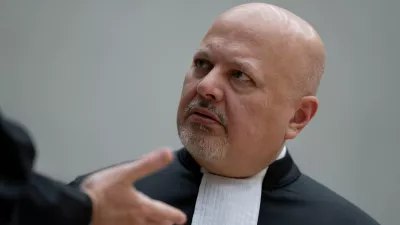FILE PHOTO: Chief Prosecutor Karim Khan talks while waiting for former Philippine President Rodrigo Duterte to appear via video link before the International Criminal Court (ICC), in The Hague, Netherlands, Friday, March 14, 2025.   Peter Dejong/Pool via REUTERS/File Photo