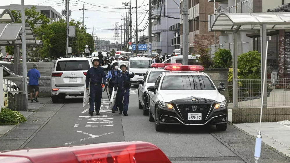 Police are seen at a residential area where a bear showed up in Utsunomiya, north of Tokyo Tuesday, June 9, 2026. (Kyodo News via AP)