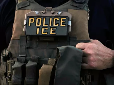 FILE - A U.S. Immigration and Customs Enforcement agent is seen in Park Ridge, Ill., Sept. 19, 2025. (AP Photo/Erin Hooley, File)