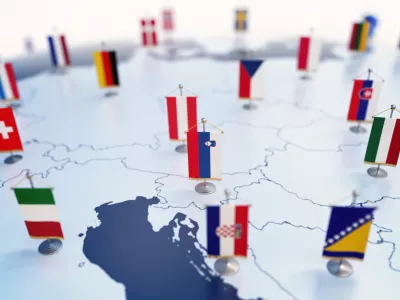 Flag of Slovenia in focus among other European countries flags. Europe marked with table flags 3d rendering