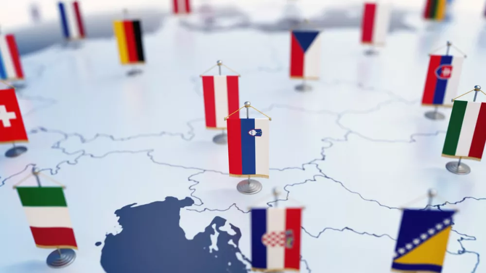Flag of Slovenia in focus among other European countries flags. Europe marked with table flags 3d rendering
