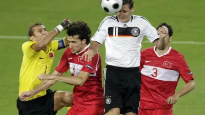Germany's Miroslav Klose, second right, scores his team's second goal during the semifinal match between Germany and Turkey in Basel, Switzerland, Wednesday, June 25, 2008, at the Euro 2008 European Soccer Championships in Austria and Switzerland. (AP Photo/Niklas Larsson)