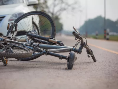 Accident car crash with bicycle on road because drunk driving.