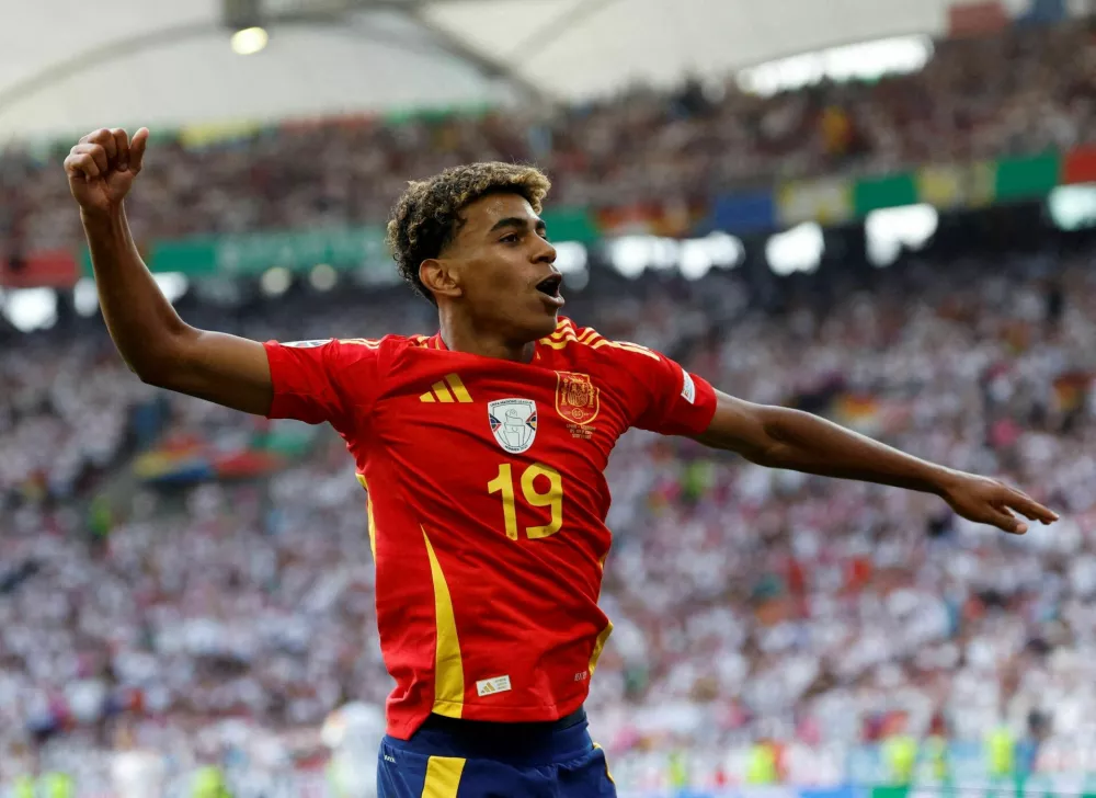 FILE PHOTO: Soccer Football - Euro 2024 - Quarter Final - Spain v Germany - Stuttgart Arena, Stuttgart, Germany - July 5, 2024 Spain's Lamine Yamal celebrates after Dani Olmo scores their first goal REUTERS/Heiko Becker/File Photo / Foto: Heiko Becker