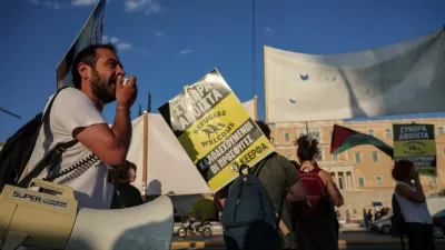 Pro-migrant and anti-racism groups protest in front of the Greek parliament, ahead of the vote on a bill which speeds up deportation of rejected asylum seekers and provides for their transfer to "return hubs", in Athens, Greece, June 9, 2026. REUTERS/Louisa Gouliamaki