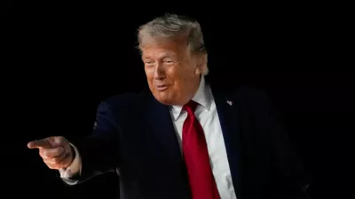 FILE PHOTO: U.S. President Donald Trump reacts as he boards Air Force One, after attending Game 3 of the NBA Finals, at John F. Kennedy International Airport in New York, U.S., June 8, 2026. REUTERS/Nathan Howard/File Photo