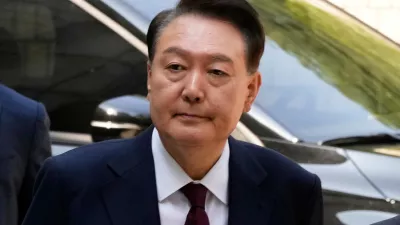 South Korea's ousted former President Yoon Suk Yeol arrives to attend his trial at the Seoul Central District Court in Seoul, South Korea, May 12, 2025. (AP Photo/Ahn Young-joon, Pool, File)