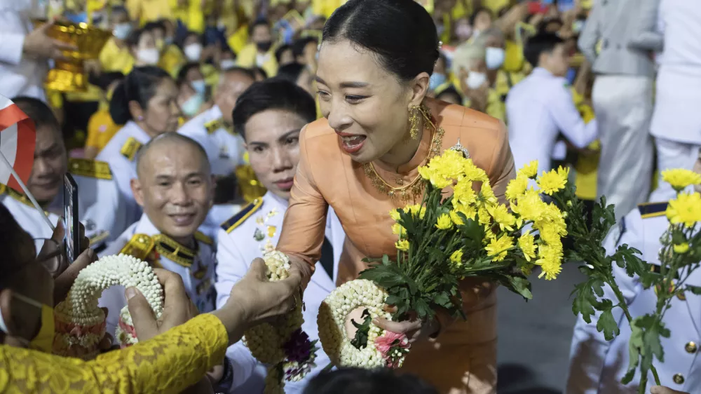 FILE - Thai Princess Bajrakitiyabha Mahidol shakes hands while meeting supporters in Bangkok, Thailand, Nov. 1, 2020. (AP Photo/Wason Wanichakorn, File)