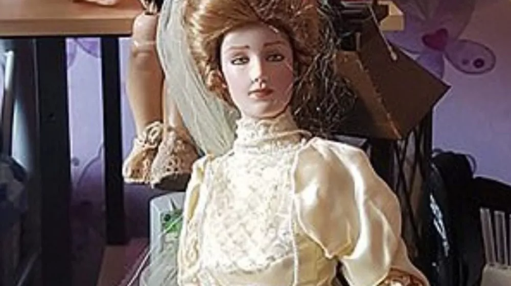 Story from Jam Press (Most Haunted Doll)Pictured: Elizabeth the doll.'I own Britain's most haunted doll &ndash; people flee the room in tears when she scratches them and pulls their hair'Visitors claim they were scratched and had their hair pulled after gathering to see a doll dubbed Britain's "most haunted".Elizabeth, a porcelain bridal doll, has already built a notorious reputation online after years of alleged paranormal incidents.But now the doll's owner, Lee Steer, says a new wave of strange encounters during two public open days has left even sceptics unsettled.The 40-year-old, who owns the Haunted Objects Museum in Rotherham, South Yorks, where the doll is kept, claims dozens of people in recent months have reported unusual experiences."Quite a few people have refused to be in the same room as Elizabeth during public museum events, especially at night," Lee, from Rotherham, South Yorks, told creatorzine.com."Some visitors feel uncomfortable almost immediately and choose to leave rather than stay near her."The incidents were spread across both days, but there did seem to be a period where activity became noticeably more concentrated, around 2pm seemed to be when the most reports started coming in."On the first day, there were cold drafts, temperature changes being picked up on the paranormal equipment, movement involving a pram, and two separate visitors claiming their hair had been pulled."On the second day, the bell-trigger equipment appeared much more active and responsive."We also had a visitor report their hair bobble being tugged, and another person noticed their bag had opened unexpectedly while near the doll."There were visitors who became overwhelmed enough to leave the room, and in some cases even step outside the building entirely to calm themselves down before returning."Once other guests started sharing their own experiences, the atmosphere naturally became much more intense, and for some people that clearly heightened the fear factor."Elizabeth, believed to be a Franklin Mint Gibson Girl bridal collector doll dating from the late 1980s, first hit headlines years ago after previous owner Debbie Merrick claimed disturbing incidents began happening in her home.According to Lee, the doll had originally been discovered in a skip before ending up in an antiques shop, where Debbie later bought it.She allegedly experienced unexplained fire alarms, moved objects and mysterious scratches before eventually listing the doll on eBay simply as a "creepy doll".Lee purchased Elizabeth for Ł866 after stumbling across the auction.He said: "For reasons I still can't fully explain, I felt drawn to the doll and decided to bid, without fully realising I was bidding on a doll that was already attracting serious press interest."Over the years, more than 30 individuals have claimed unusual experiences after being around the doll, including unexplained scratches, burns, emotional distress, strange dreams, and other unsettling incidents."Since then, Elizabeth has become one of Britain's best-known allegedly haunted objects.But Lee says the most recent incidents have been among the strangest yet.During special daytime opening events at the museum, visitors travelled from across the UK specifically to spend time near the doll.Several people reported phones freezing, restarting or refusing to record near the doll.Lee said: "Since I bought Elizabeth, lights flicker, objects move, items are knocked over, and strange disturbances happening when there's no obvious explanation."What's always stood out to me is that it often seems to happen when something new is introduced into the museum, almost like a jealous reaction."Whether that's paranormal or something else, those moments are definitely the creepiest to witness firsthand."One particularly unsettling moment involved a child's pram which visitors claimed appeared to move on its own.Another example, he claims, involved perfume bottles being "thrown across a room with force" rather than simply falling over accidentally.According to Lee, a man who had spent time around Elizabeth later collapsed during a Ouija board session in another part of the building.Lee insists he remains sceptical despite years spent investigating the doll.He said: "I think scepticism is healthy."In some cases there may well be logical explanations such as accidental scratches, environmental factors, or people simply not noticing when something happened."What makes it interesting to me is when similar reports keep coming from different people, often independently of each other."I'm not here to force a paranormal explanation on anyone, but after seeing the number of repeated claims over the years, I do think it's worth documenting and investigating rather than dismissing outright."I fully understand that in today's world, with social media, editing, and AI, people question everything and rightly so."But for me, what matters most is what I've personally seen and experienced in real life that I genuinely can't explain through normal means."Following the latest incidents, Lee says stricter rules may soon be introduced for guests entering Elizabeth's room, including requests not to provoke or mock the doll.Visitors are forbidden from touching Elizabeth.Despite the doll's sinister reputation, Lee says he has no plans to get rid of her, despite believing she could be dangerous.Lee said: "If ghosts or paranormal energy are genuinely real, then Elizabeth could potentially be dangerous simply because of the type of incidents people have associated with her over the years."It's not just scratches, it's the larger disturbances that make you think."There was even an incident at a London train station where the departure boards went down while travelling with her."That could absolutely be coincidence or bad timing, and I'm honest about that."But when you start seeing enough strange incidents stack up around one object, you naturally begin asking bigger questions."Whatever is happening around Elizabeth, whether paranormal or something else, I'm interested in understanding it rather than getting rid of her."ENDSEDITOR'S NOTE: Video Usage Licence: (EXCLUSIVE) We have obtained an exclusive licence from the copyright holder. A copy of the licence is available on request.Video Restrictions: None.,Image: 1106387403, License: Rights-managed, Restrictions: EDITOR'S NOTE: Video Usage Licence: (EXCLUSIVE) We have obtained an exclusive licence from the copyright holder. A copy of the licence is available on request.Video Restrictions: None., Model Release: no 