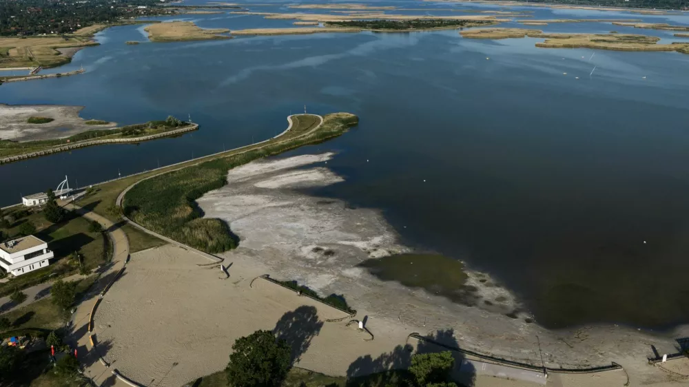 A drone view of the drying Lake Velence, Hungary's third-largest lake, where years of drought and insufficient water retention have led to critically low water levels in Velence, Hungary, June 9, 2026. REUTERS/Marton Monus
