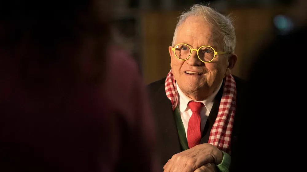 FILE PHOTO: British artist David Hockney poses inside Westminster Abbey, where he has designed a new stained glass window, in London, Britain, September 26, 2018. Victoria Jones/Pool via REUTERS/File Photo